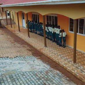 A father in Uganda donated land for one classroom. Today, 450 children learn where emptiness once stood.