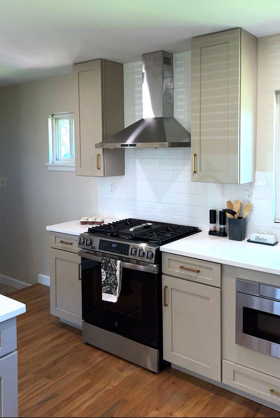 St. Louis custom kitchen with stainless steel gas range and subway tile backsplash