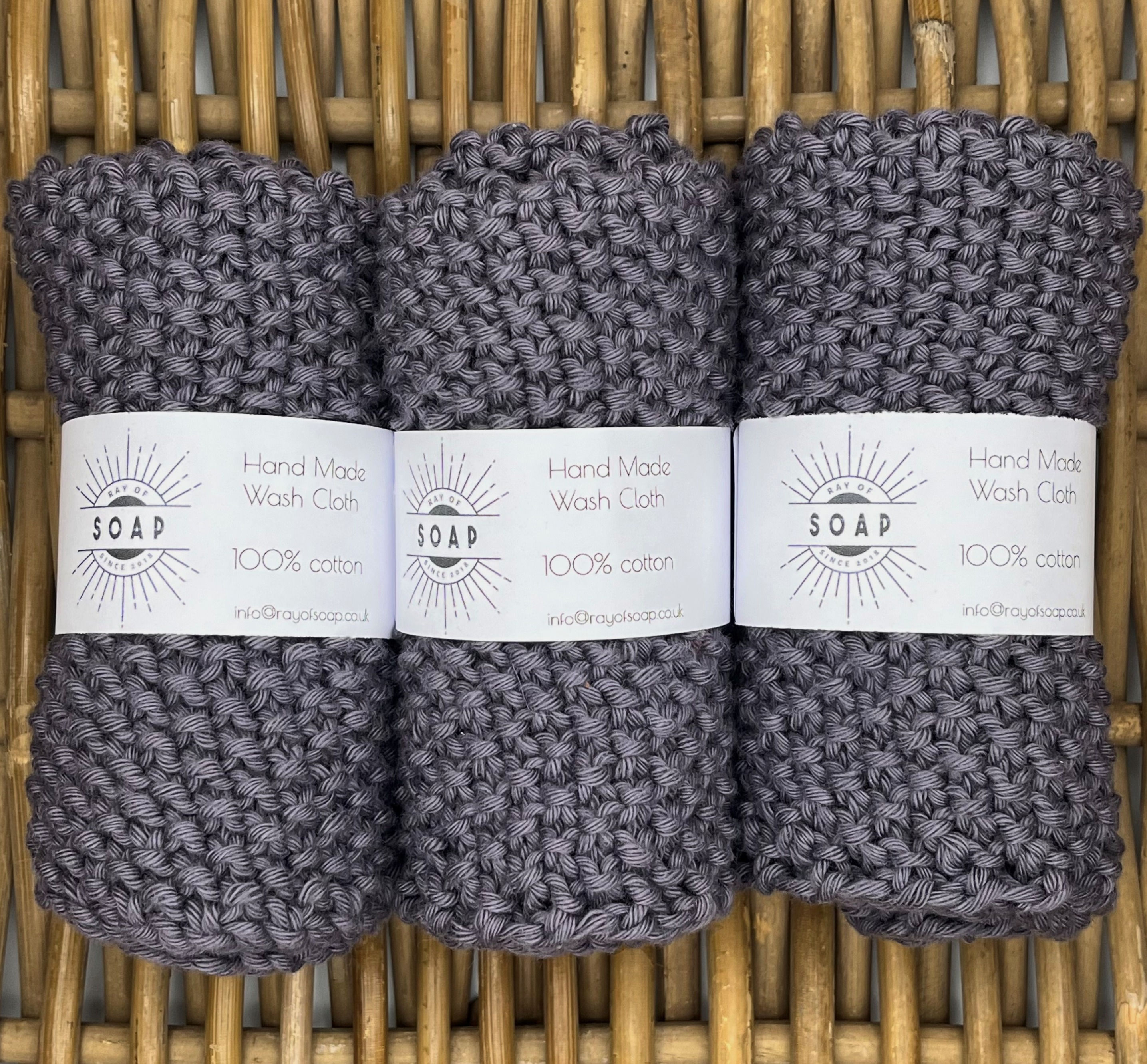 Dark grey hand knitted wash cloth