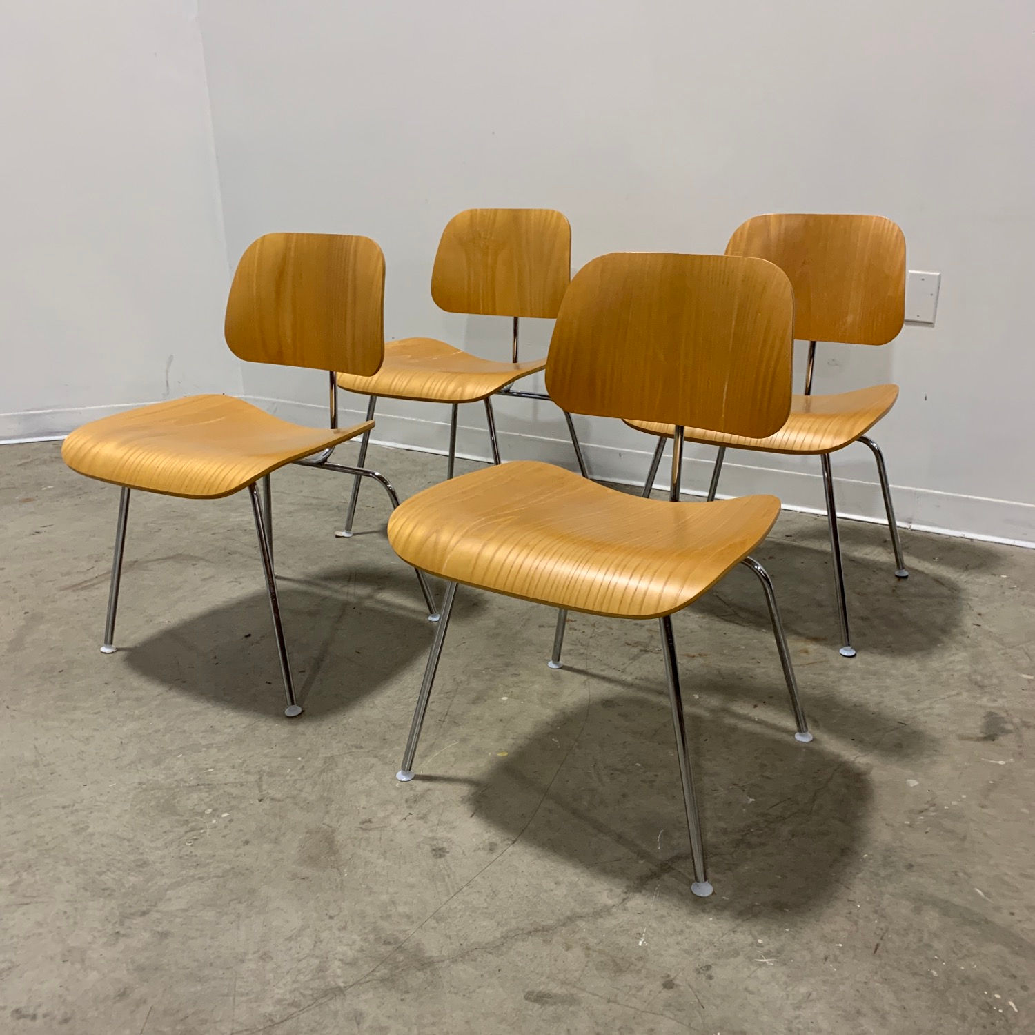 4 Eames Ash DCM chairs by Herman Miller