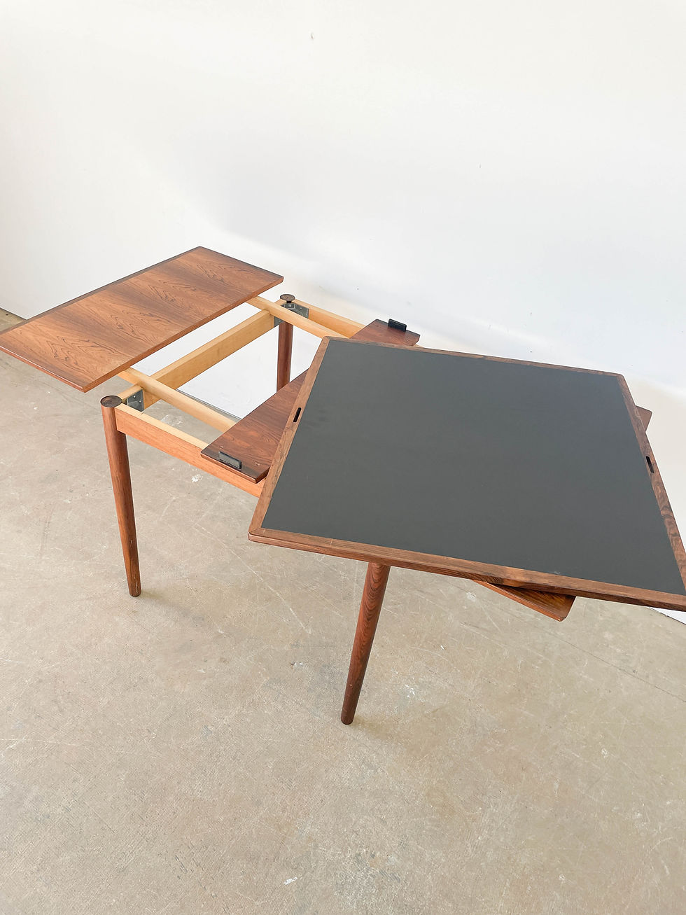Thumbnail: Danish modern Rosewood and Leather table by Carlo Jensen for Hundevad & Co.
