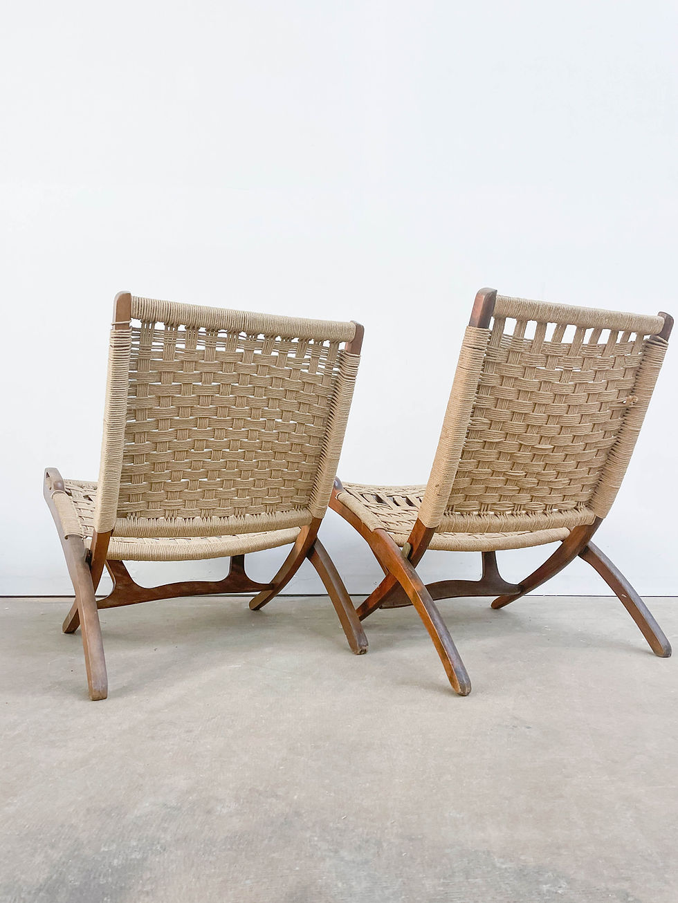 Thumbnail: Mid Century Folding Rope Chairs in the style of Hans Wegner