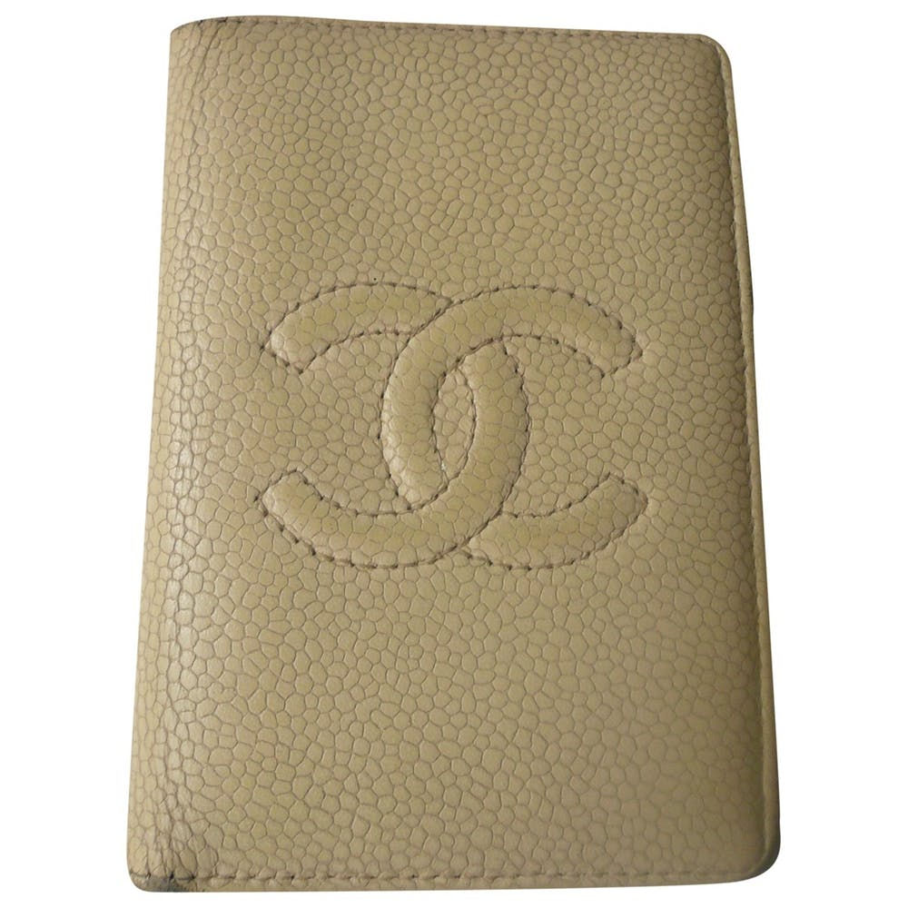 CHANEL Porte carte cuir beige état moyen