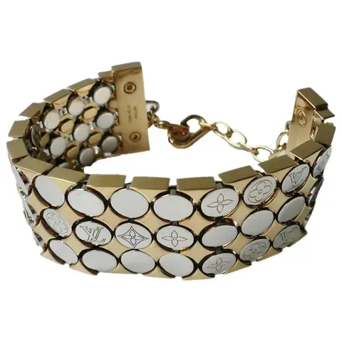 Miniature : LOUIS VUITTON Manchette métal doré et argenté rare TBE