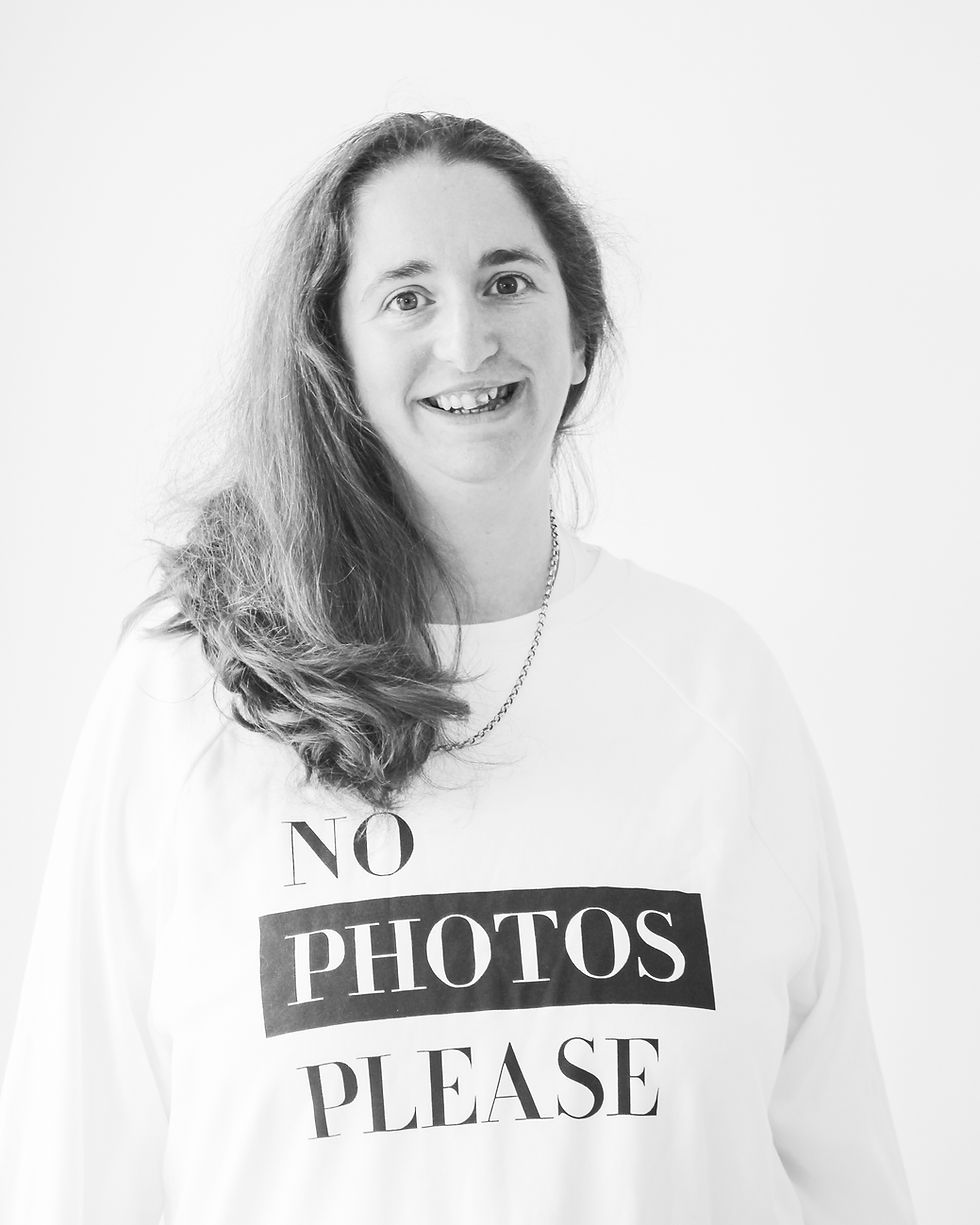 Photo of lucinda price wearing jumper saying No Photos Please