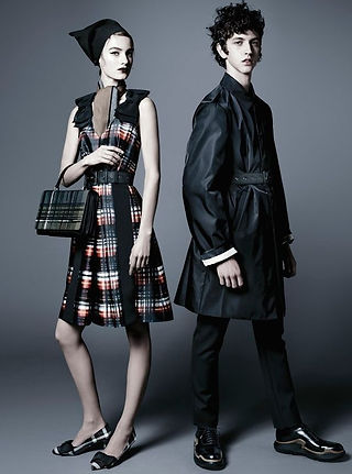 "Real-life Example Where Visual Psychology is Evident: Prada – Steven Meisel Campaigns"  Cold gazes, desaturated colors, minimalist framing. Everything is designed to convey intellectualism and emotional distance.