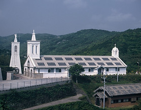 Shitsu Church is characterized by its clean white plaster exterior.