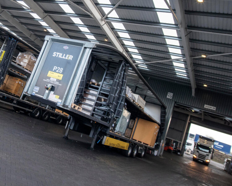 Stiller P28 truck unloading at warehousing dock