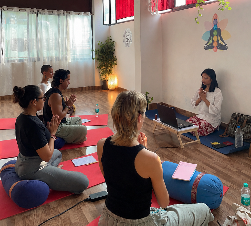 An intimate, small group sound healing and Reiki training session with singing bowls and gongs in a acoustically treated studio container at AARAK in Rishikesh, India.