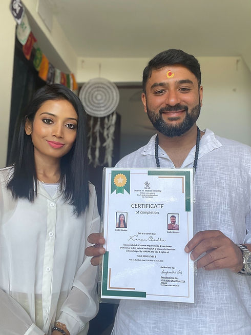 aarak-school-testimonial-page-male-student-holding-healing-course-certificate-with-instructor