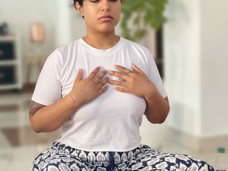 A student practicing traditional Usui Reiki hand placements during a certification course at an authentic Reiki school in Rishikesh, India.