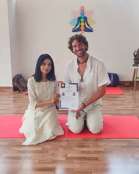 aarak-school-testimonial-page-instructor-presenting-certification-to-graduating-student