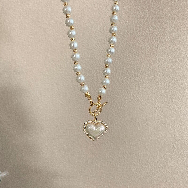 Thumbnail: Elegant Pearl Necklace Heart Pendant