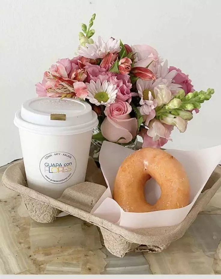 Mother’s Day coffee, donut, and flower gift set in a takeout tray.