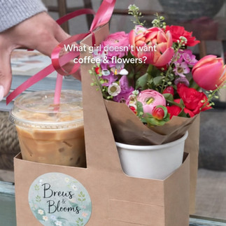 Mother’s Day grab-and-go treat with coffee, donut, and pink floral arrangement in a carry tray for apartment resident event ideas.