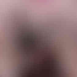 A black metal cart with wooden shelves is styled as a pet station, filled with baskets of treats, toys, grooming tools, and pet accessories. Two white baskets are on the floor nearby.