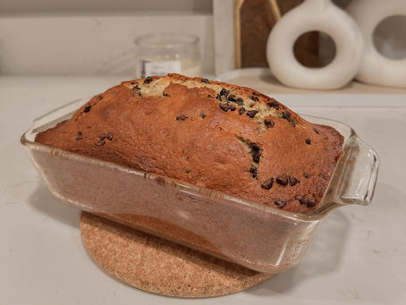 Moist homemade banana bread made from scratch, ready to be sliced and served for breakfast or a snack.