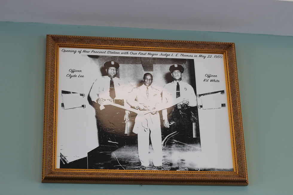 Officers Clyde Lee & Officer R.V. White at the ribbon-cutting ceremony of May 22, 1950 pictured here with Judge Thomas.