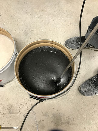 Jet black epoxy flooring.jpeg