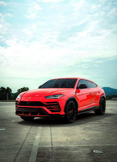 Red Lambo Lamborghini Urus rental in Metro Atlanta, Marietta, Buckhead, Decatur, Alpharetta, Lawrenceville, Roswell, Norcross, Duluth, Woodstock, Stone Mountain, Sandy Springs, high-performance luxury SUV