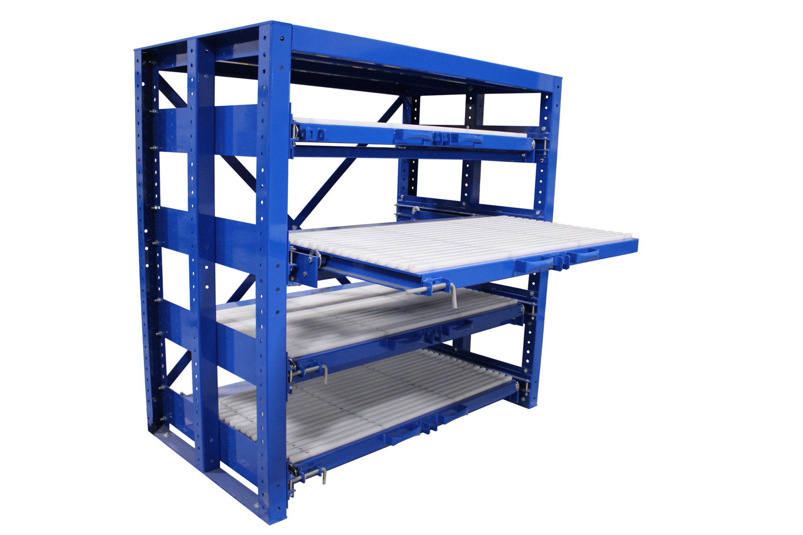 Glide-out shelf rack storing dies and tooling with a shelf extended for crane access