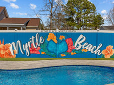 Mural by Myrtle Beach Area Artist, Michelle Ricalde. Floral mural featuring heart hands