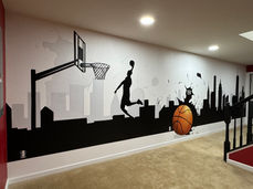 Basketball themed mural. NYC skyline. Silhouette by Myrtle Beach Artist, Michelle Ricalde