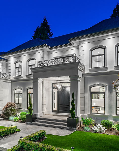 A luxury white mansion entrance