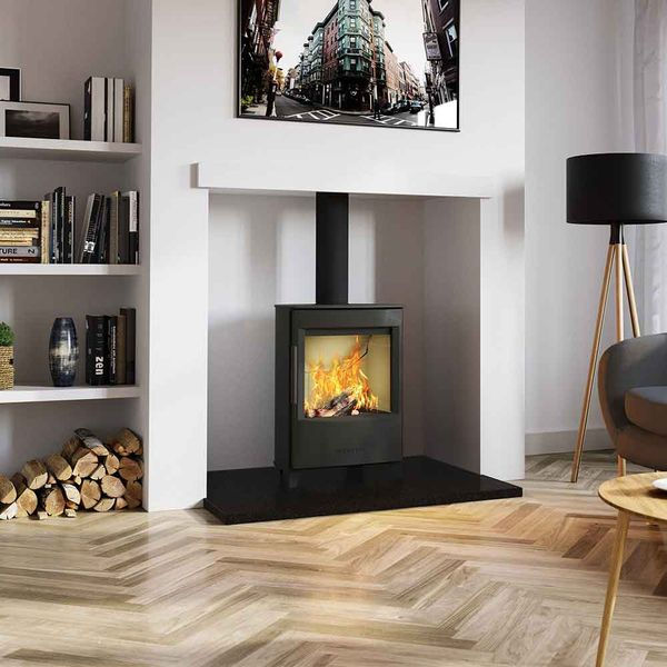 Simple Fireplace with black granite hearth and a white fireplace chamber with a Hwam Wiking Mini 2 woodburning stove
