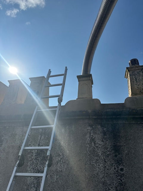 Flexible flue liner installation in Wareham Dorset.jpg