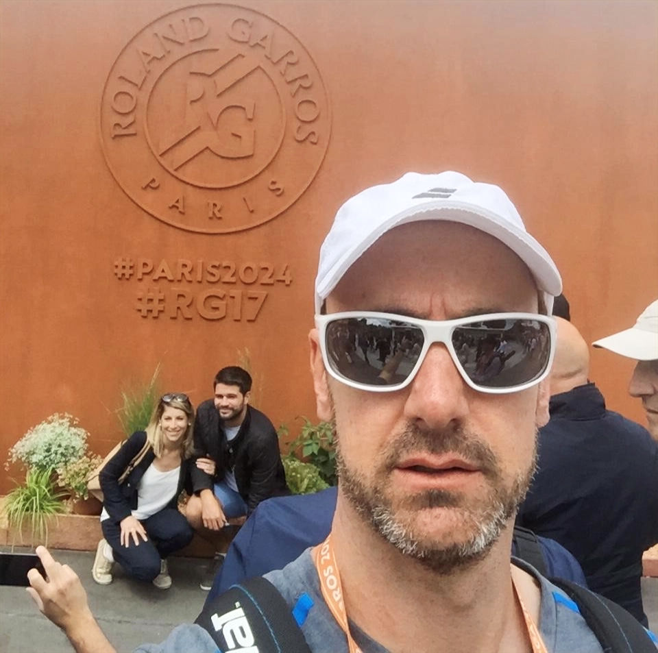 Tennis player running the net