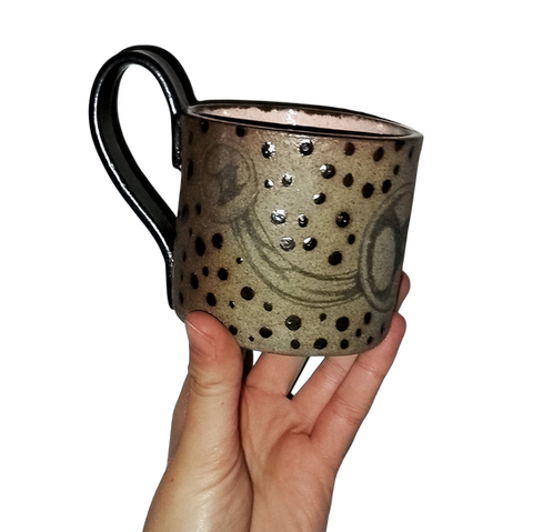 Stoneware mugs with drawing of piercing and gunmetal polkadots