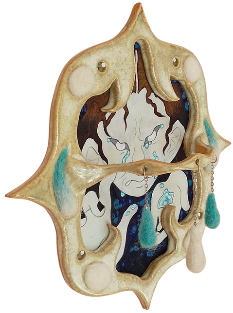 mixed media wallhanging with painting of crying person inside of a stoneware frame with felted teardrops in blue and white
