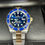 Thumbnail: Rolex Submariner Blue Dial Blue Bezel on Two Tone Oyster Bluesy