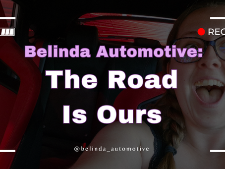Woman excitedly sitting in a car with red interior. Text: "Belinda Automotive: The Road Is Ours." REC symbol and battery icon present.