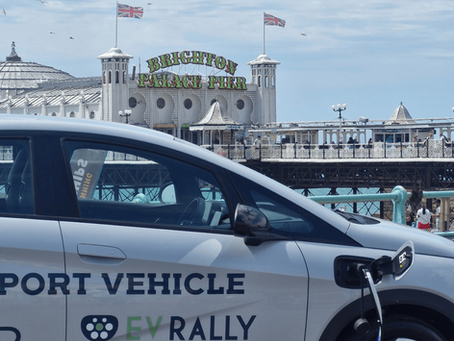 Image of the London to Brighton support vehicle charging with the Brighton pier in the background