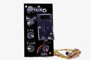 This handmade drum synthesizer, specially designed for Okay Temiz, was produced to be mounted inside the artist’s custom-made berimbau. The drum synthesizer can be triggered via a piezo sensor and is designed to be played directly from the berimbau. Additionally, a manual envelope gate button was included for testing purposes during sound design.