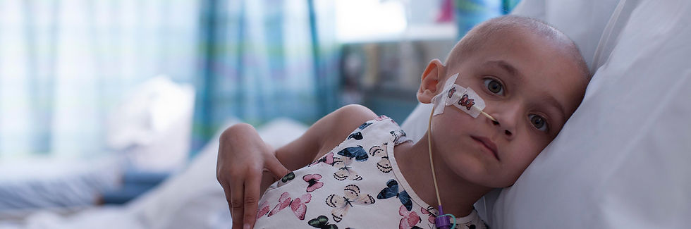 Child-with-sad-face-in-hospital-bed-with