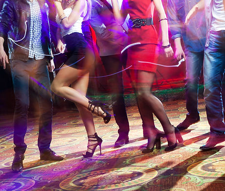 feet of people dancing on a club party. unrecognizable.jpg