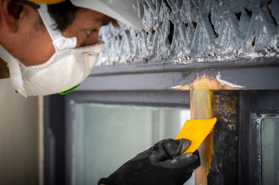 Restoration contractor working onsite on building site in London.