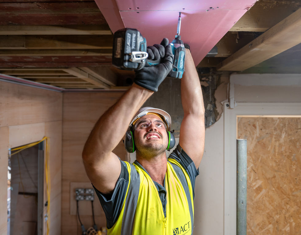 High end residential house builder working onsite in London.
