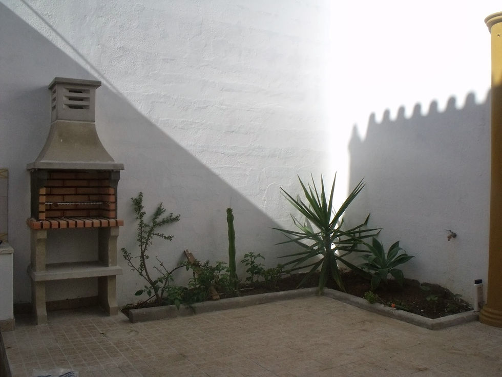 Pátio exterior com barbeque