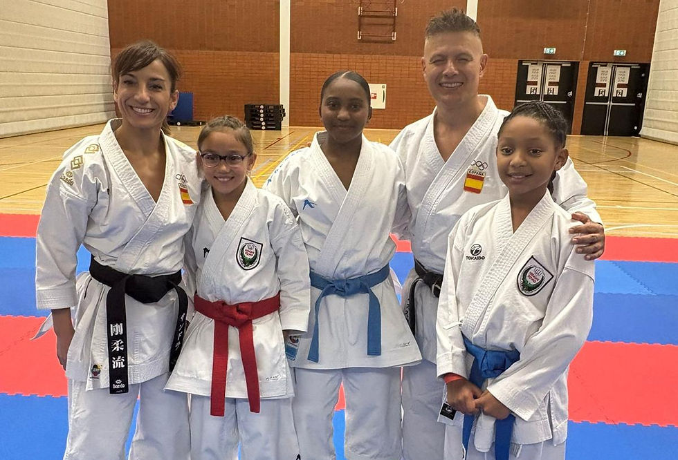 None other than world champion kata competitor Sandra Sanchez posing here with some of the squad!