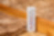 Fiberglass insulation in attic of house with thermometer. Home energy savings, heating and