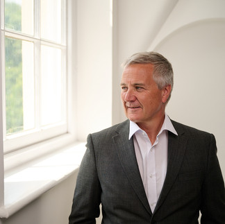Fraser Scott - CEO - Hamworthy, dressed in a grey suit with white shirt