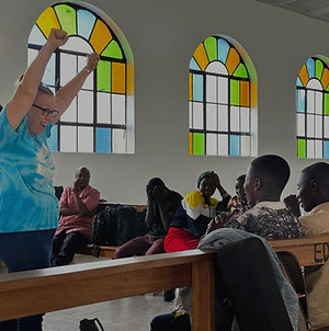 No Boundaries International instructor teaching teens at a trauma healing meeting.