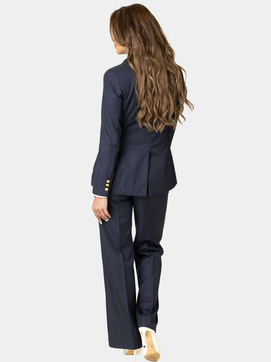 Costum bleumarin din lână pentru femei, vedere din spate cu sacou și pantaloni