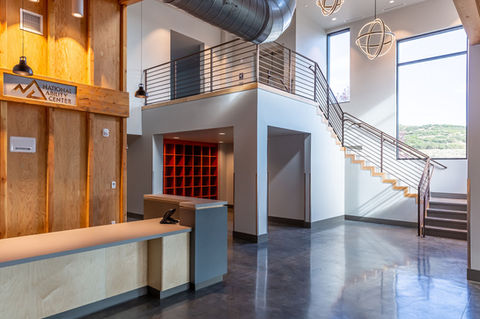 A lobby space with a staircase.