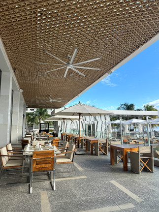 Outdoor seating area at Hotel Mousai Cancun