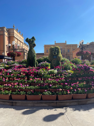 Lady and The Tramp Topiary Garden Display in front of the France pavillion at Epcot Disney World